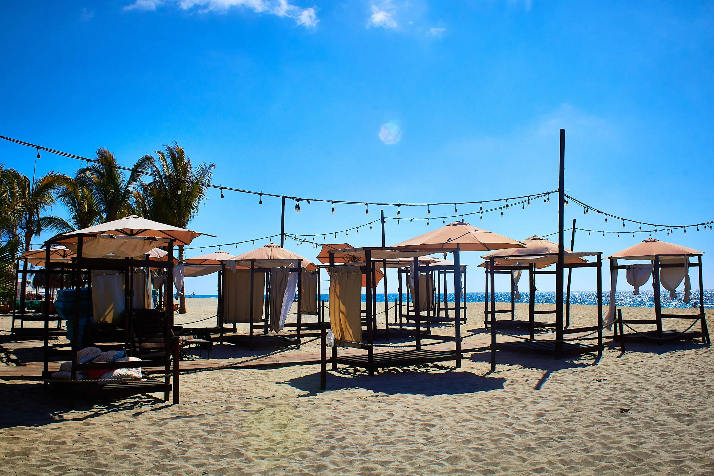 Beach loungers on the sand in Puerto Escondido, Oaxaca