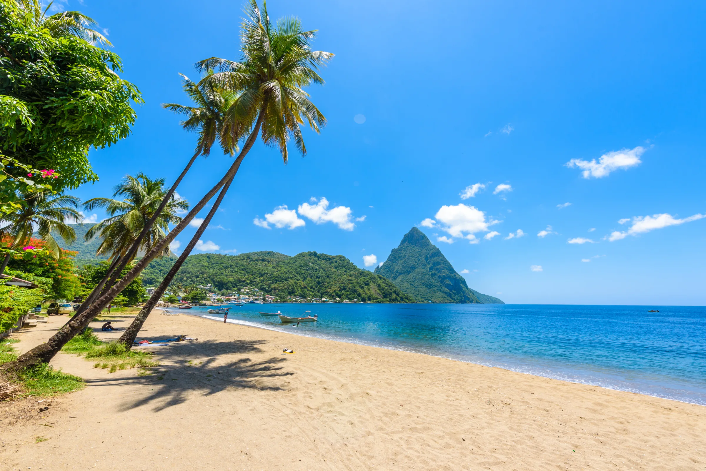 Soufrière Bay beach with the Pitons rising behind the town of Soufrière, St. Lucia