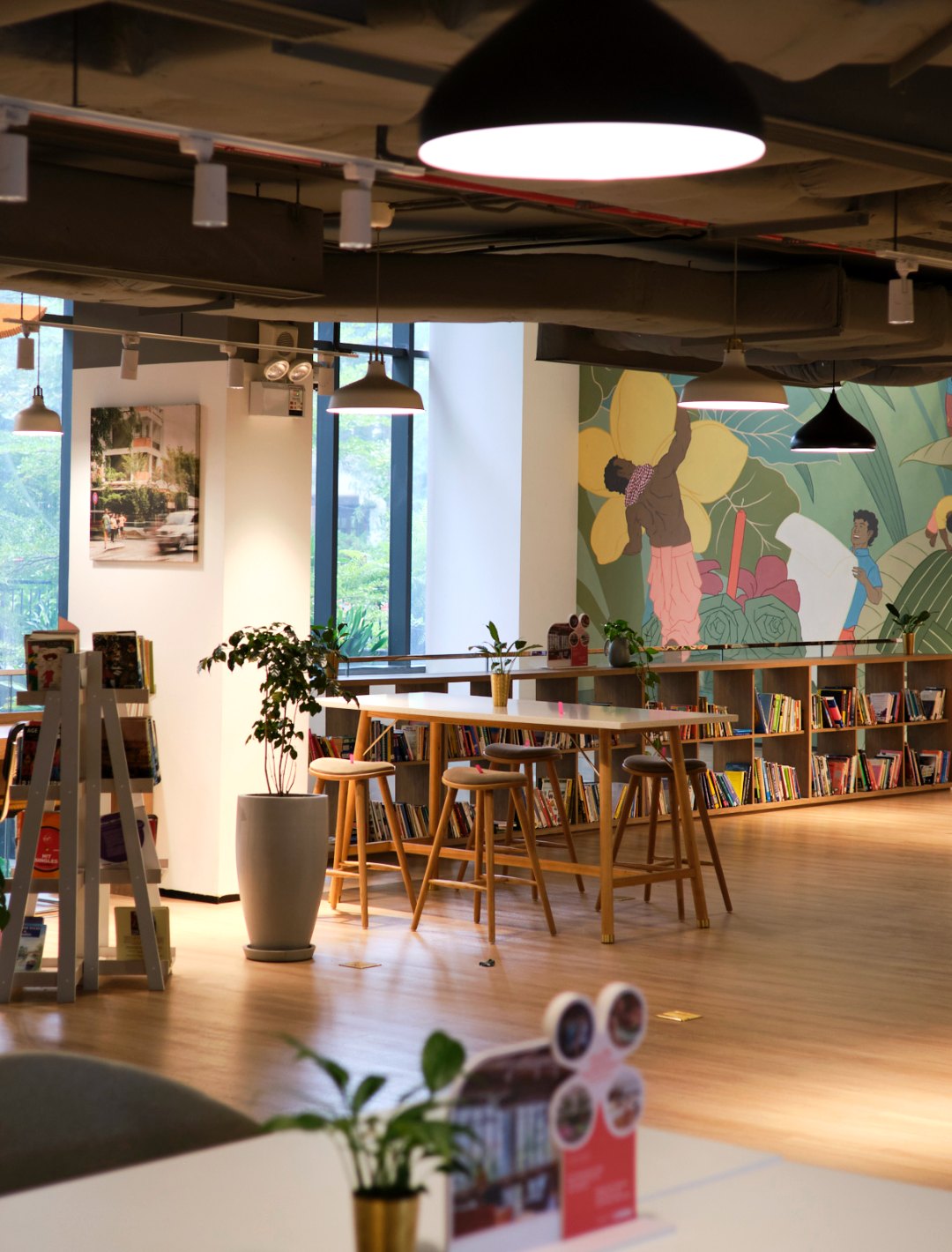 Browse books or choose from a high table or desk height seating to get work done.