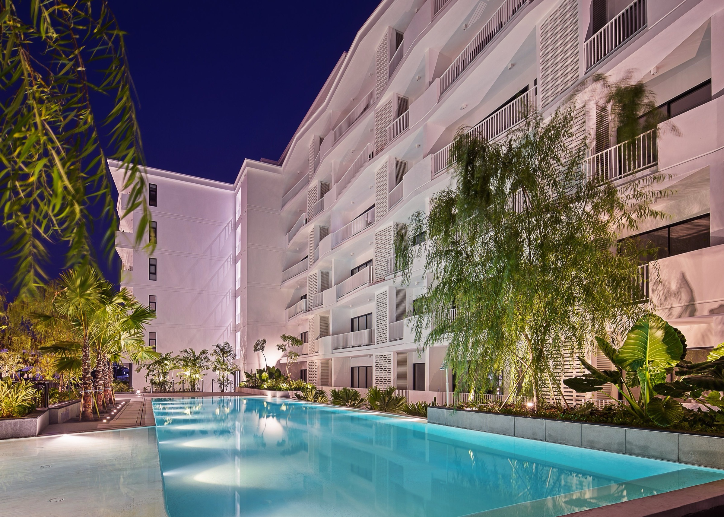 The pool at night, lit along its full length
