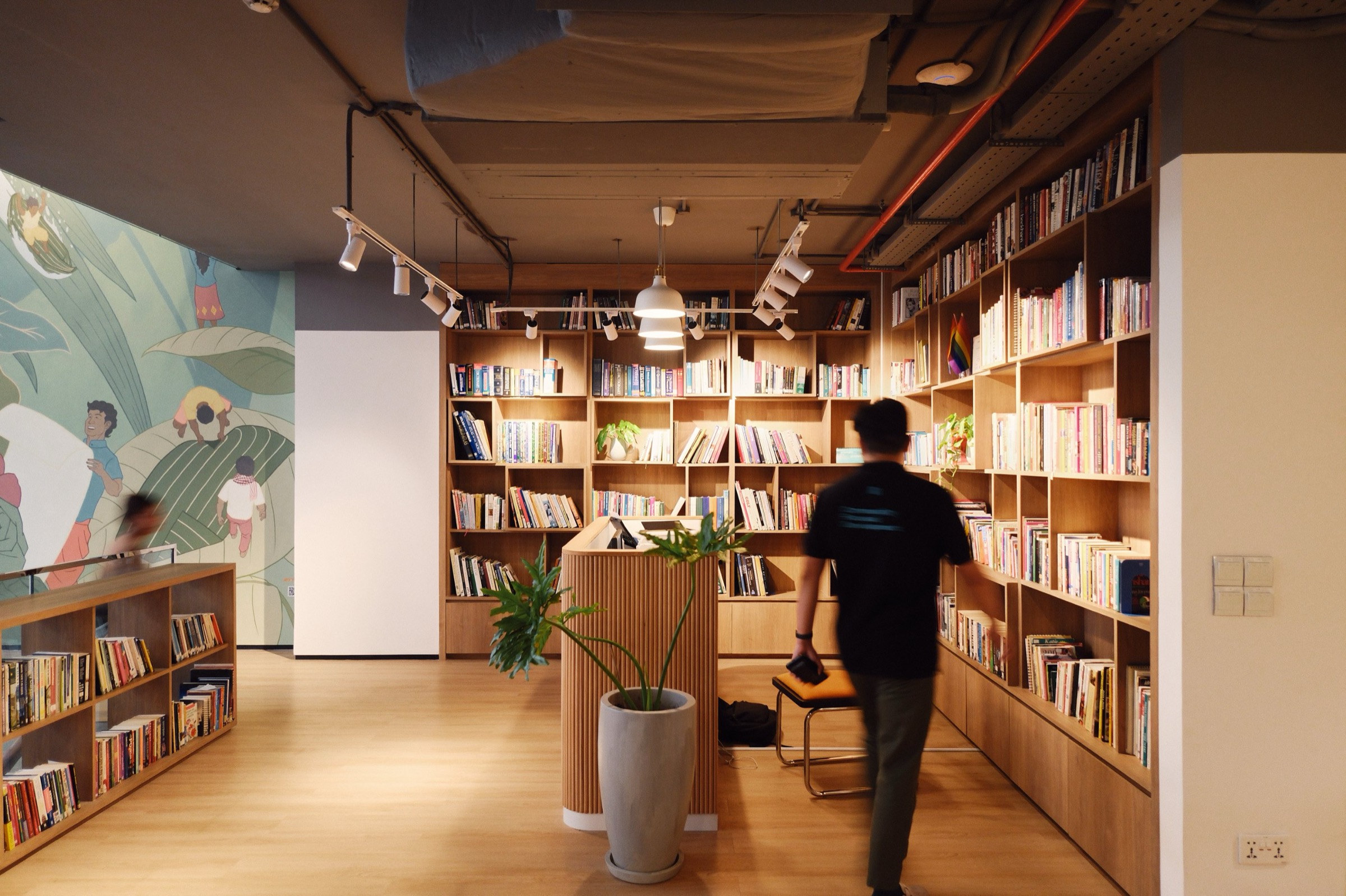 The library wall at Commune Work