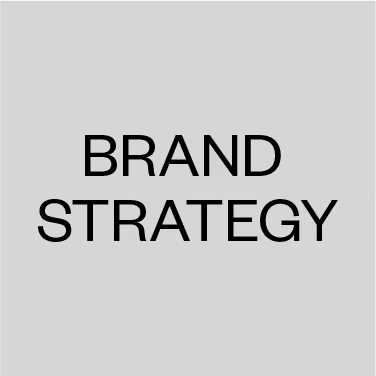 Text reading 'BRAND STRATEGY' in bold black letters on a gray background.