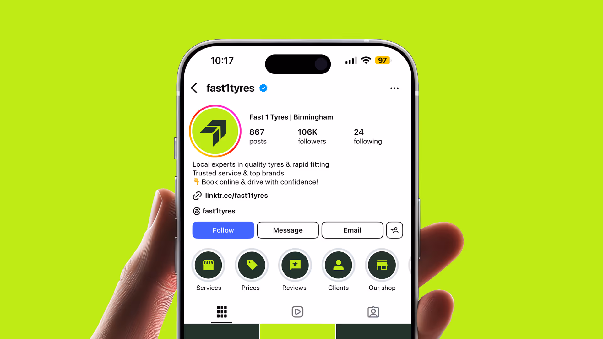 Hand holding a smartphone displaying the Instagram profile of fast1tyres with 106K followers and options to follow, message, or email.
