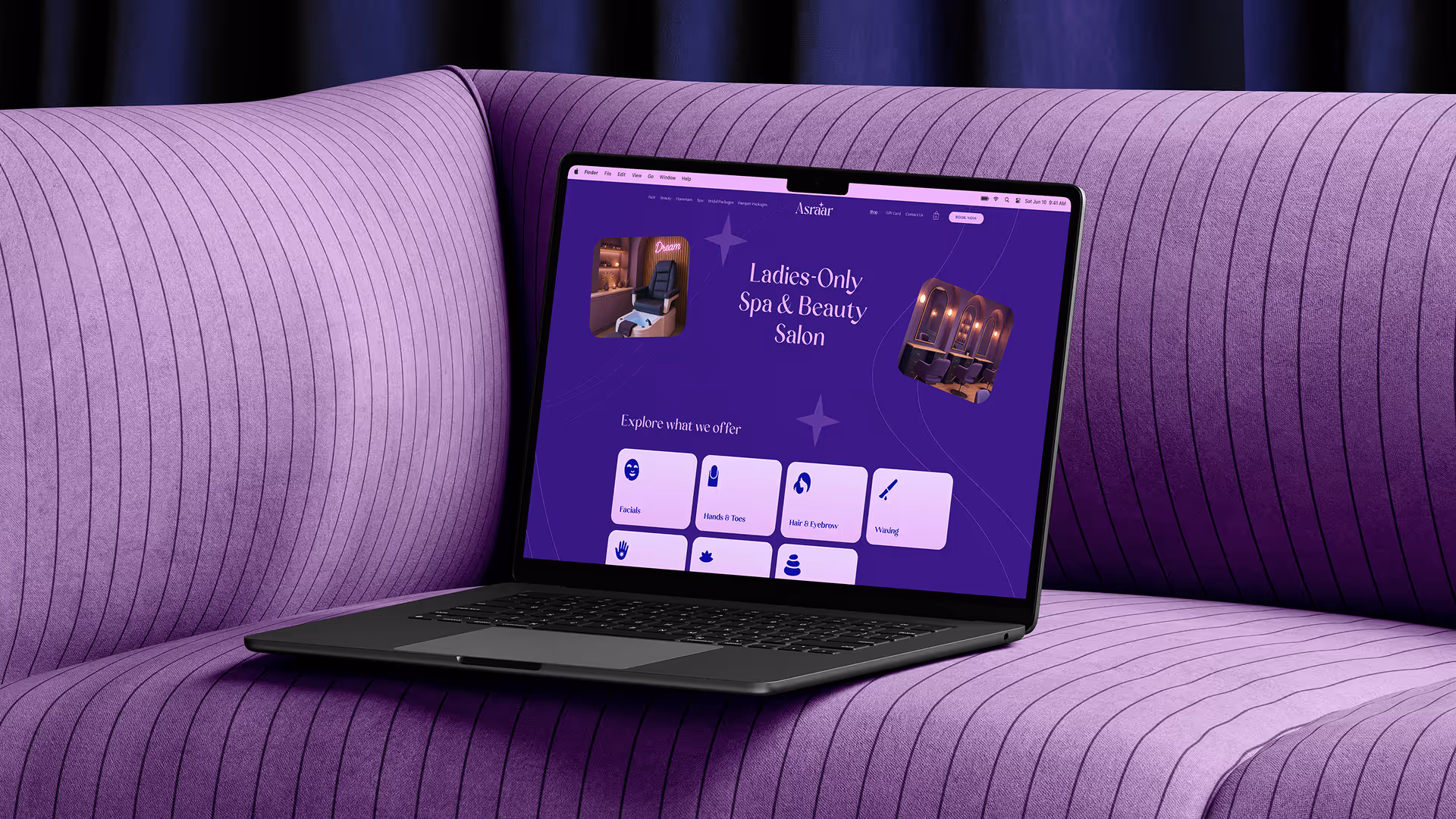 Open laptop displaying a purple-themed ladies-only spa and beauty salon website on a purple striped couch.