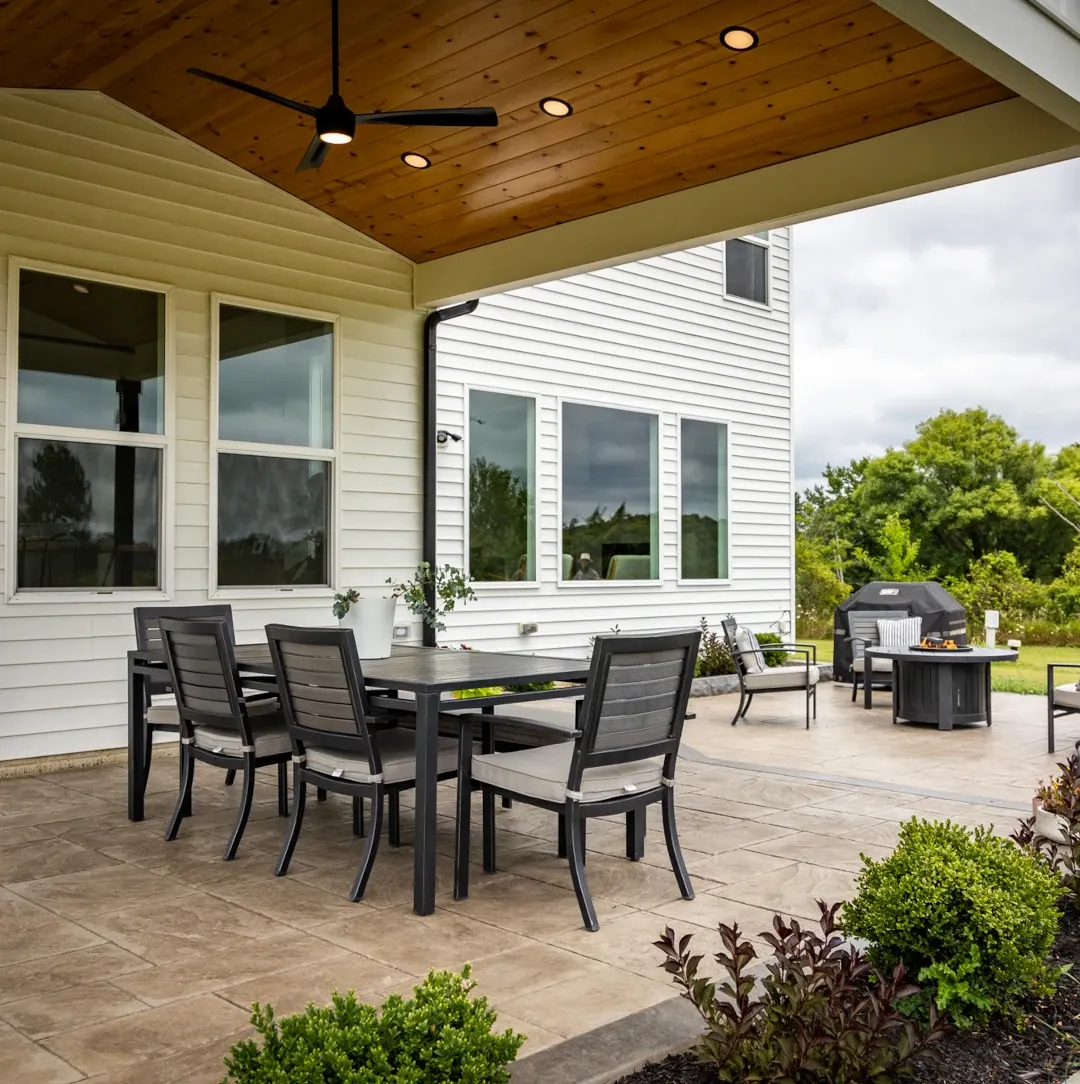 outdoor room with patio furniture under roof