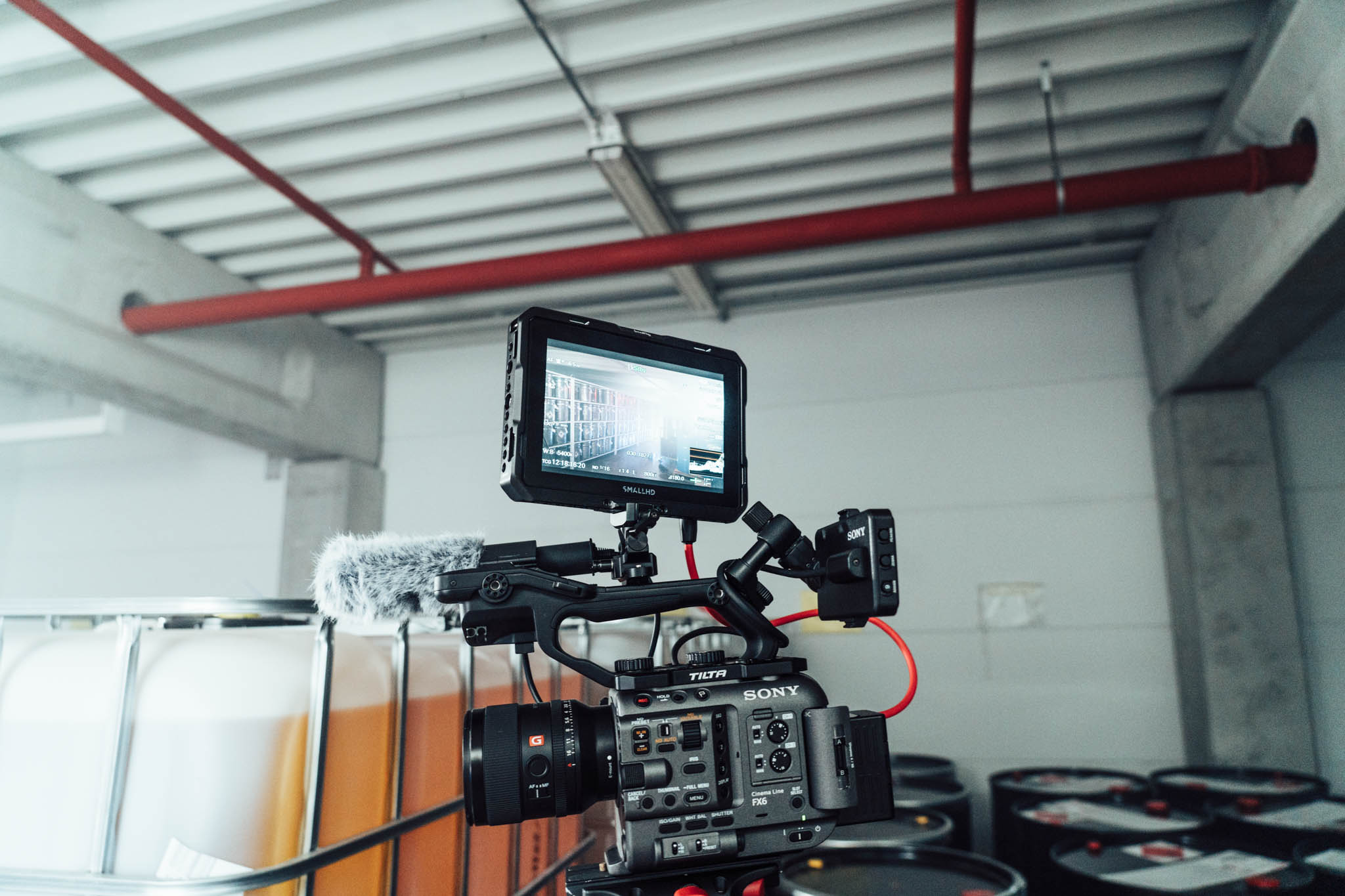 Sony cinema camera set up in an industrial warehouse