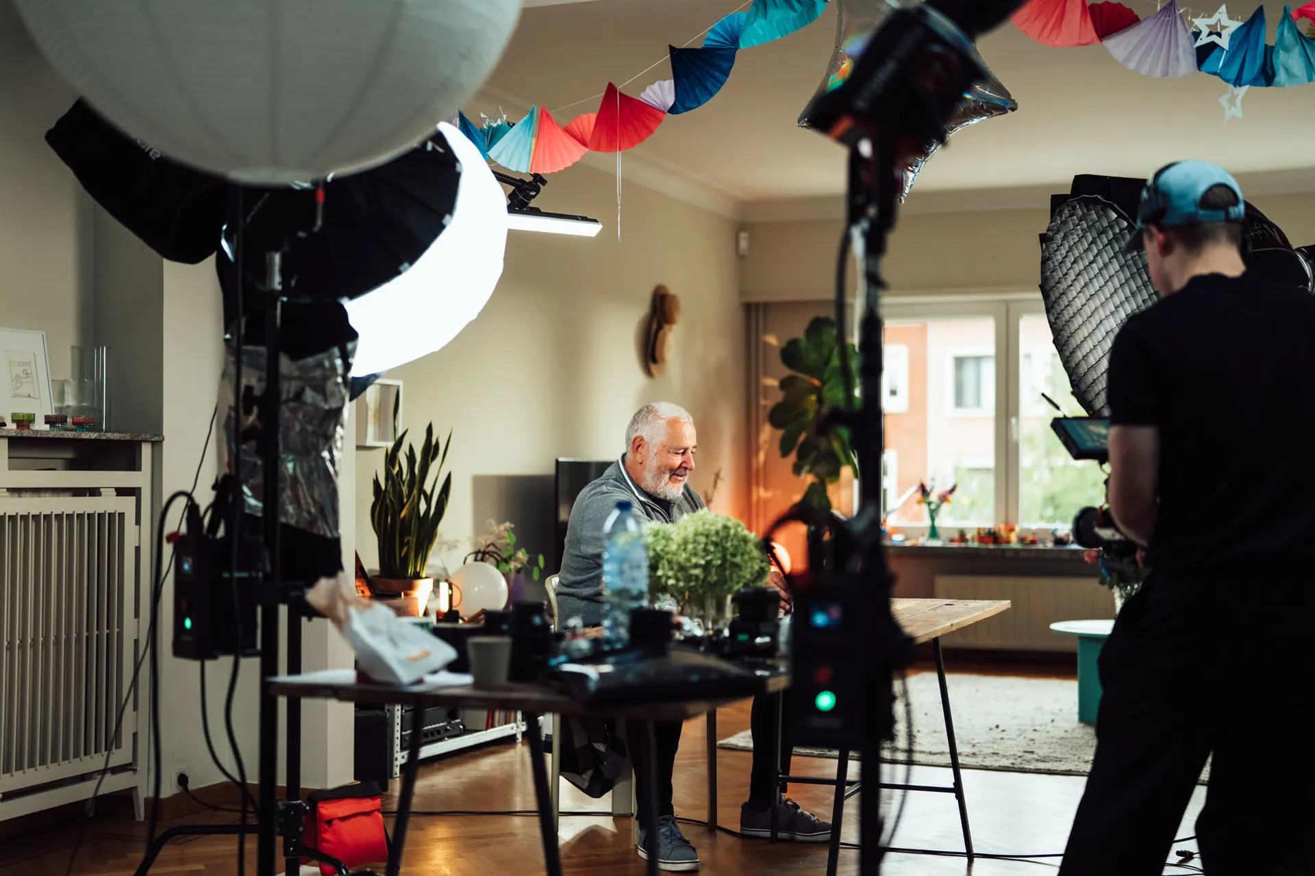 Majortale crew filming an older man at home for Eneco