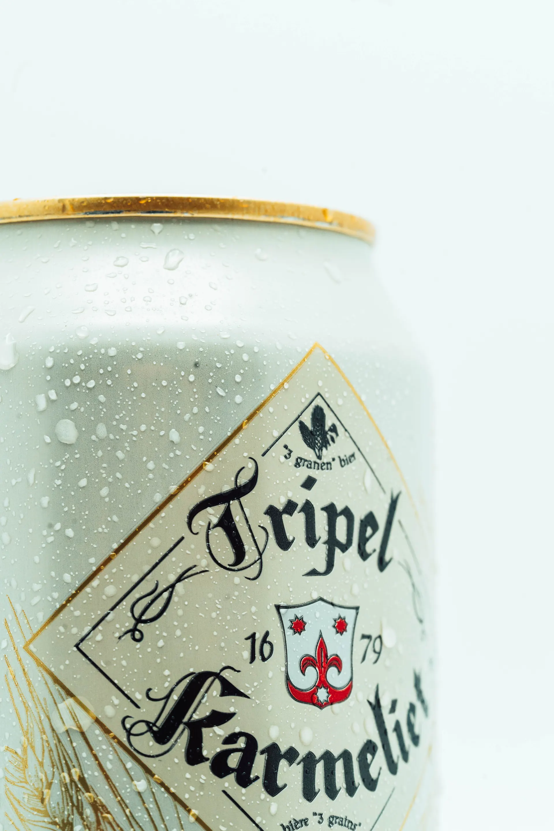Close-up of a chilled Tripel Karmeliet can with condensation