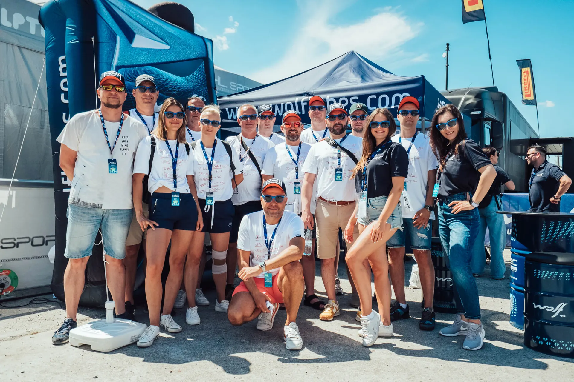 Wolf Lubricants team group photo at a rally service area