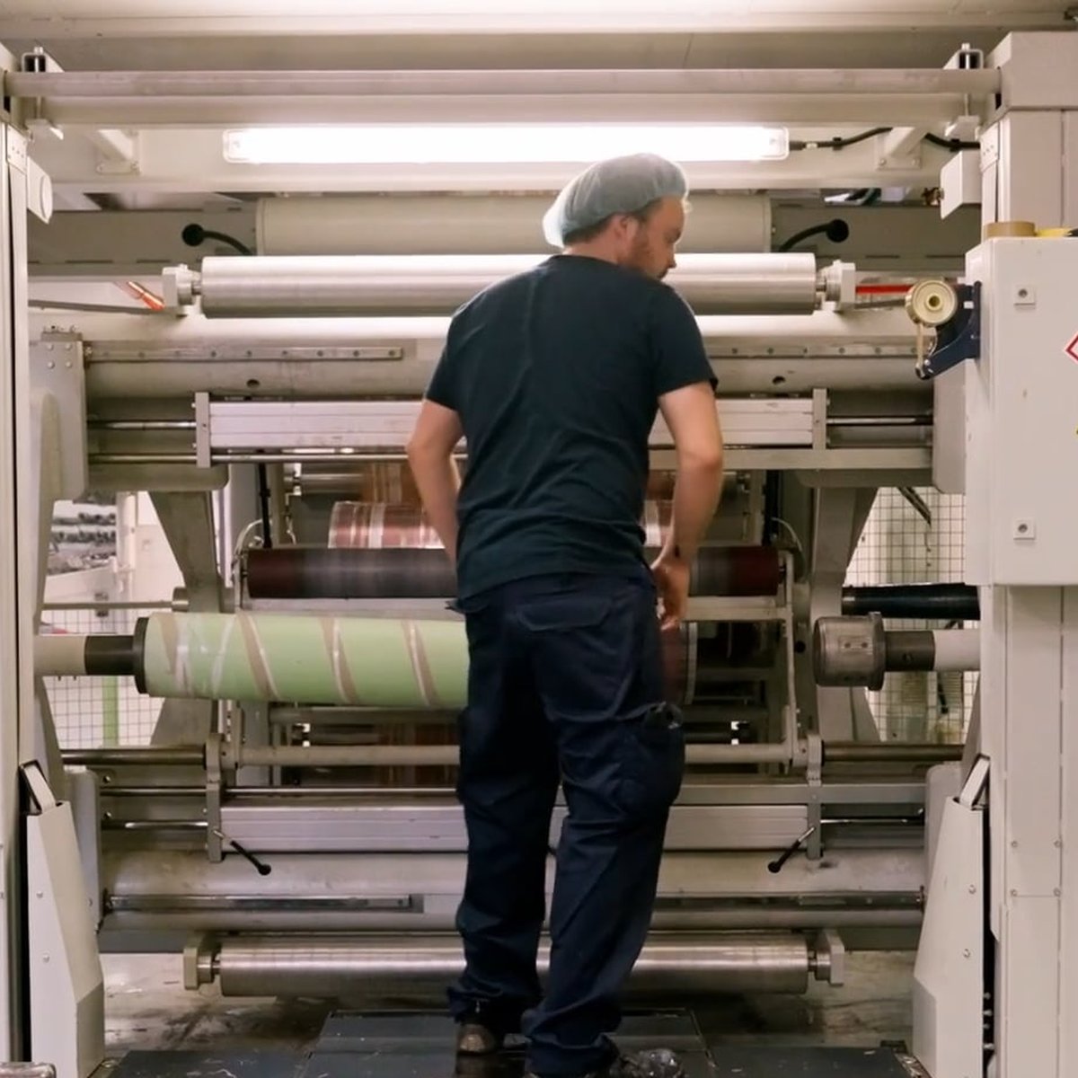 VitraPack machine operator at a printing press