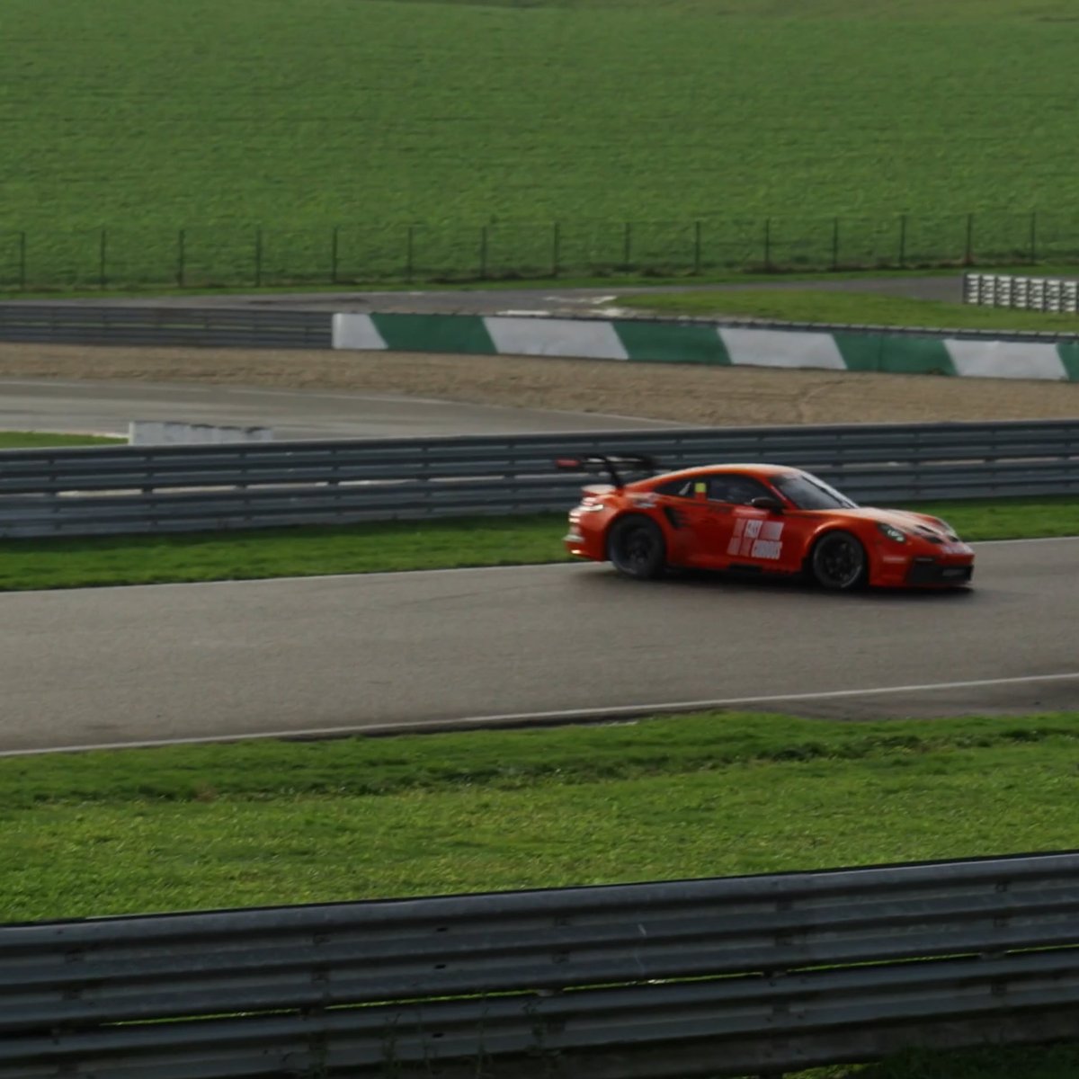 Red Champion Lubricants Porsche on track