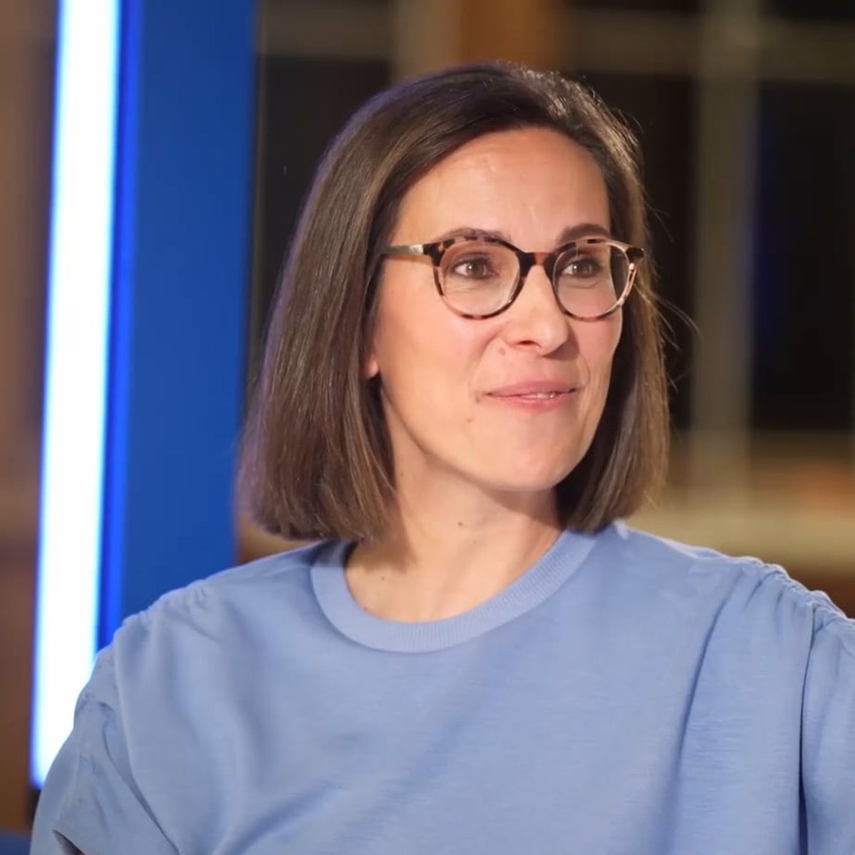 Bank van Breda employee with glasses smiling during an interview