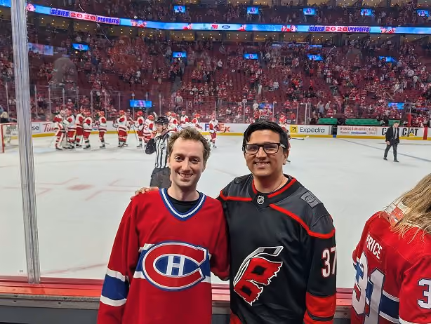 Affiniti team members at a hockey game