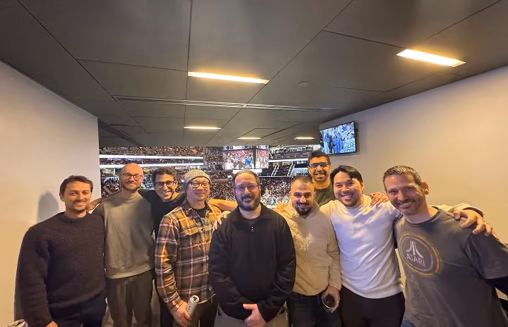 The Affiniti team in a stadium suite