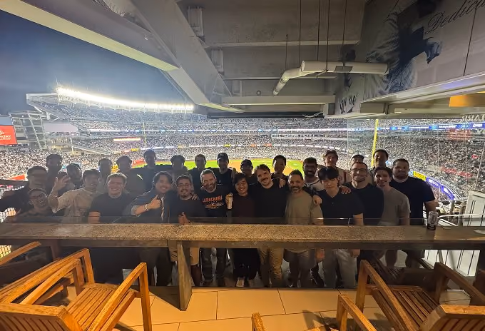 The Affiniti team at a baseball stadium