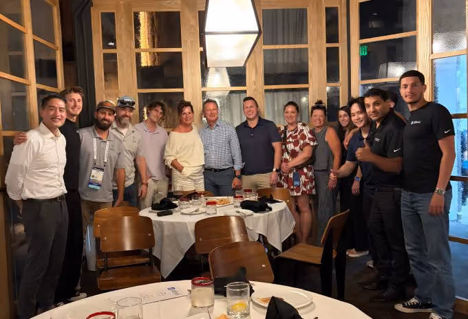 The Affiniti team and guests at a restaurant dinner