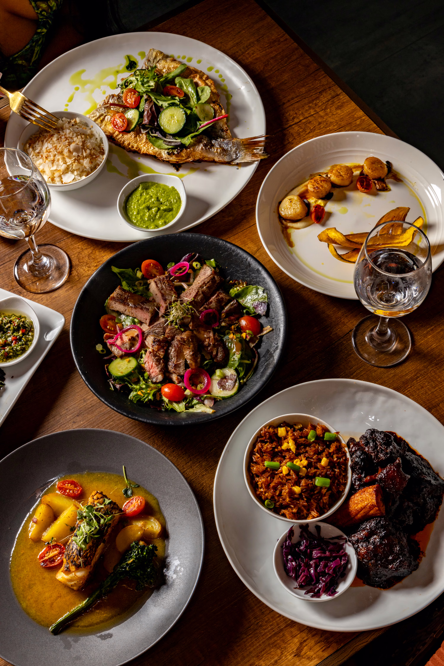 A table of shared plates seen from above at Bloom Bar