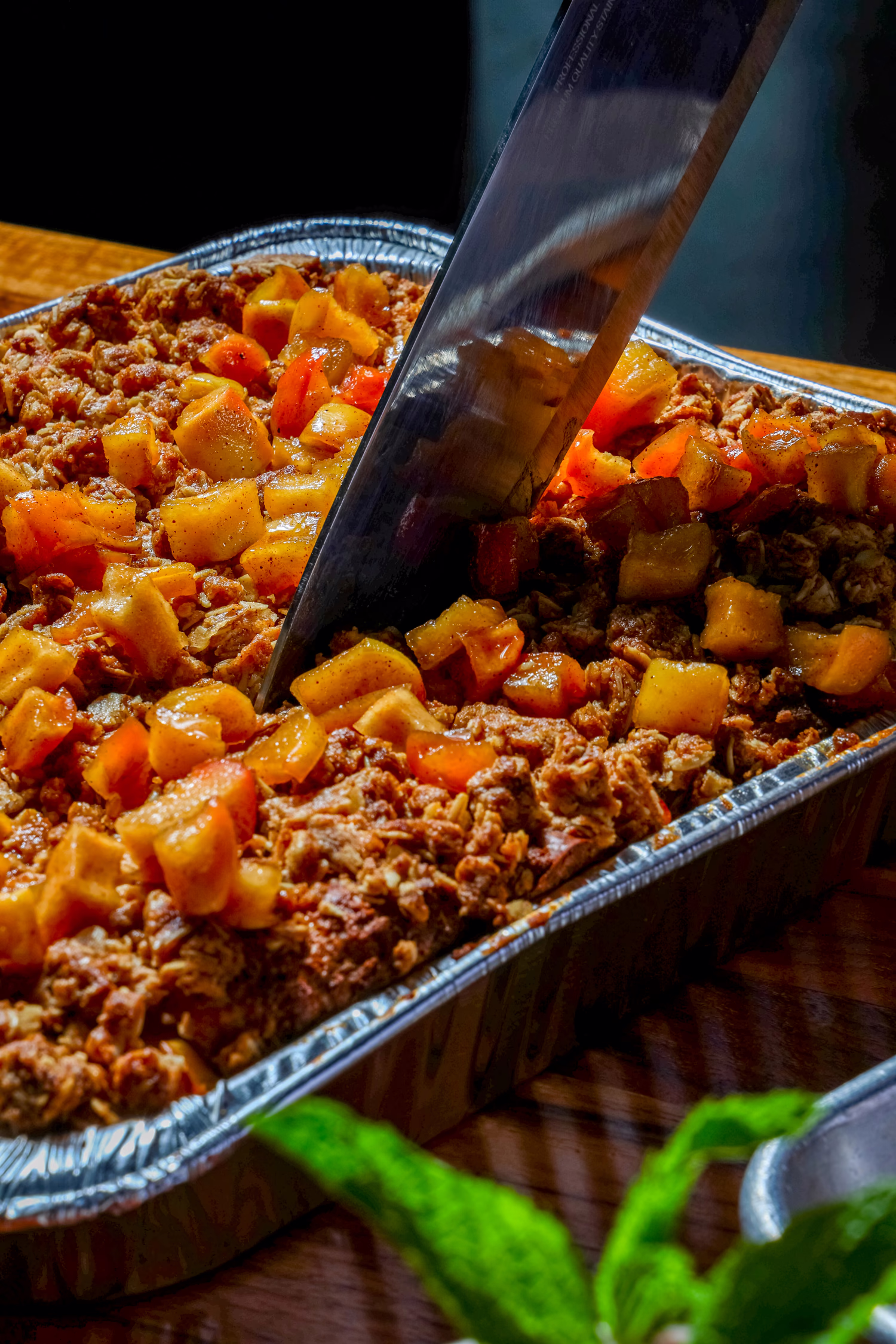 A catering tray of sweet potato hash being served at Dime Store