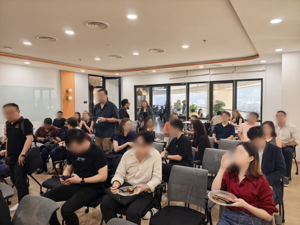 Participating in an entrepreneurship gathering to exchange ideas and build professional connections