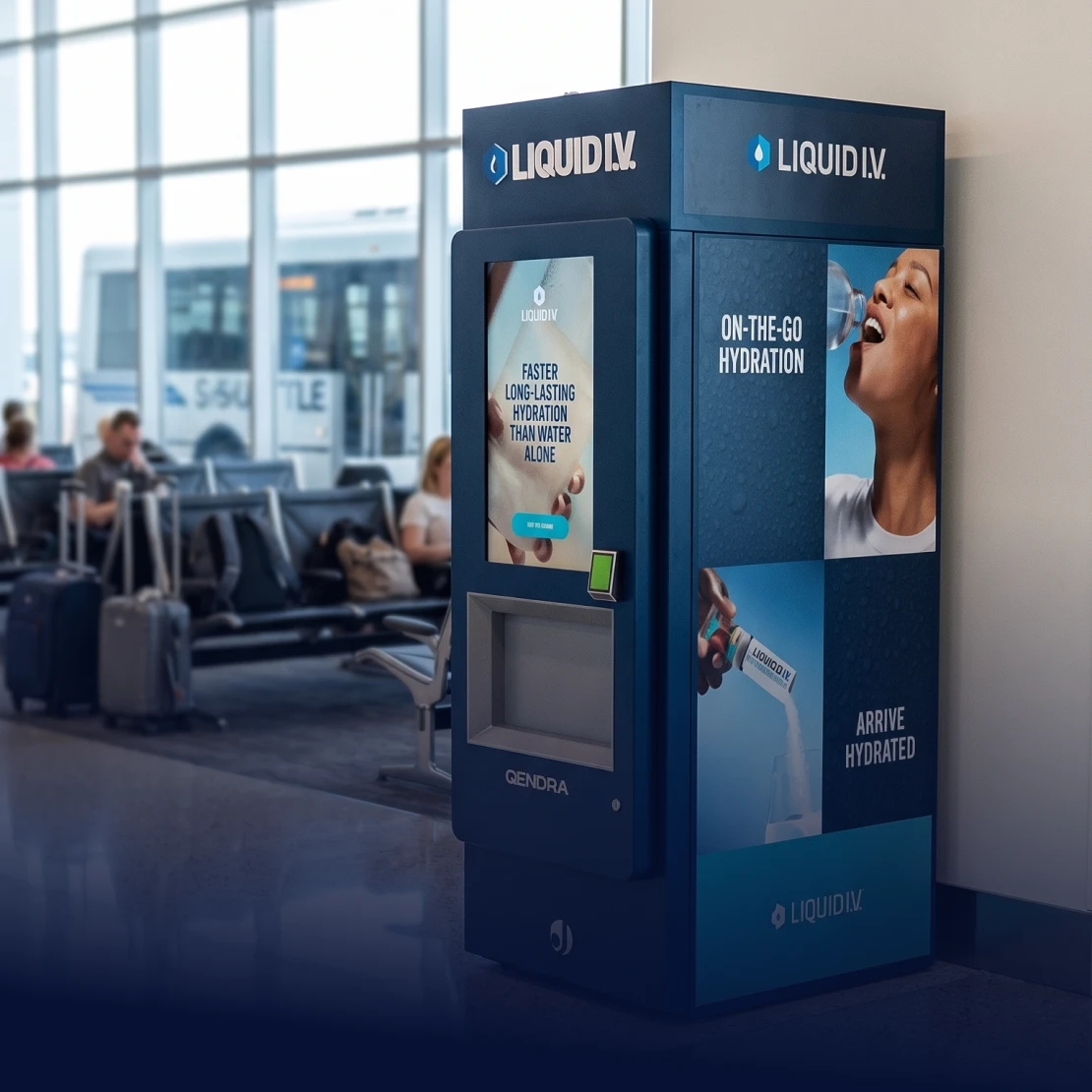 LiquidIV kiosk beside seating in an airport terminal.
