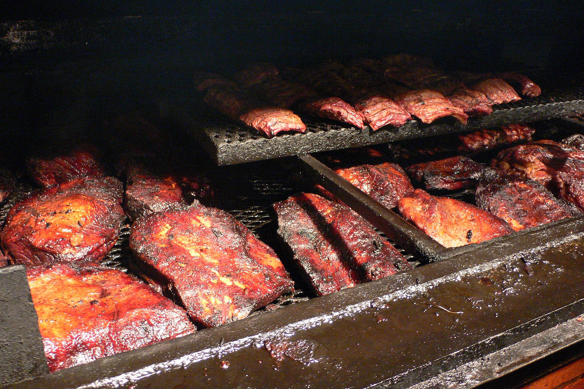 Briskets and ribs on the pit at Black's Barbecue in Lockhart