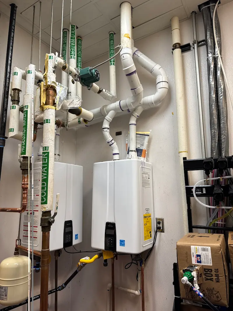 Licensed plumber repairing a residential gas line