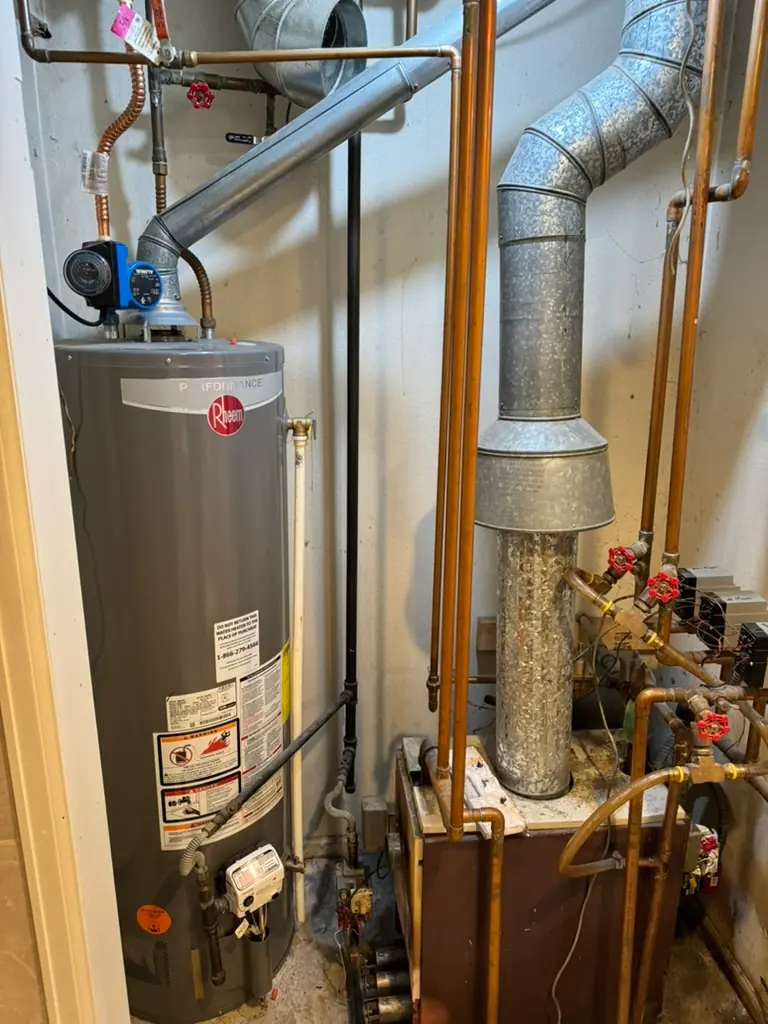 Licensed plumber repairing a residential gas line