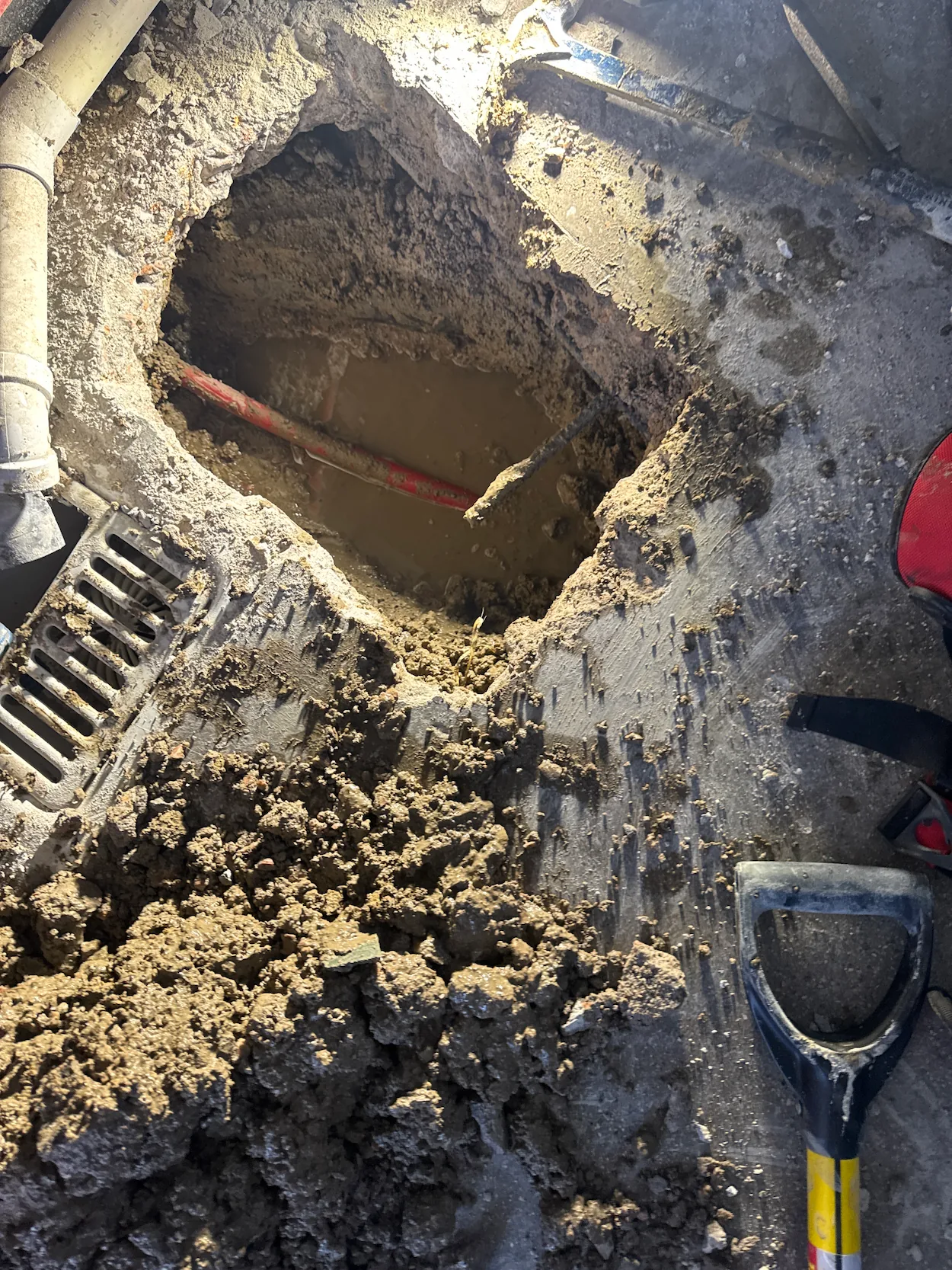Licensed plumber repairing a residential gas line