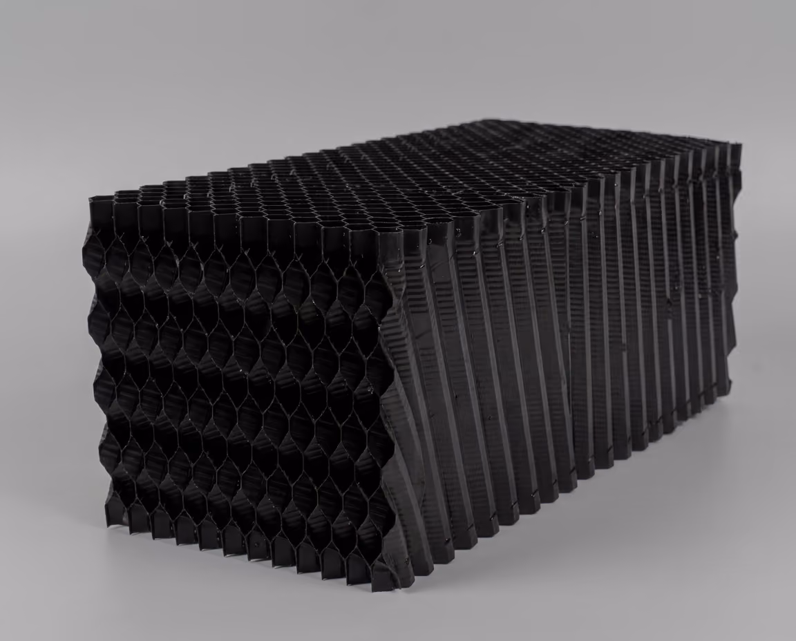 Cooling tower fills block with a honeycomb pattern made from PVC material made by a reputed manufacturer.