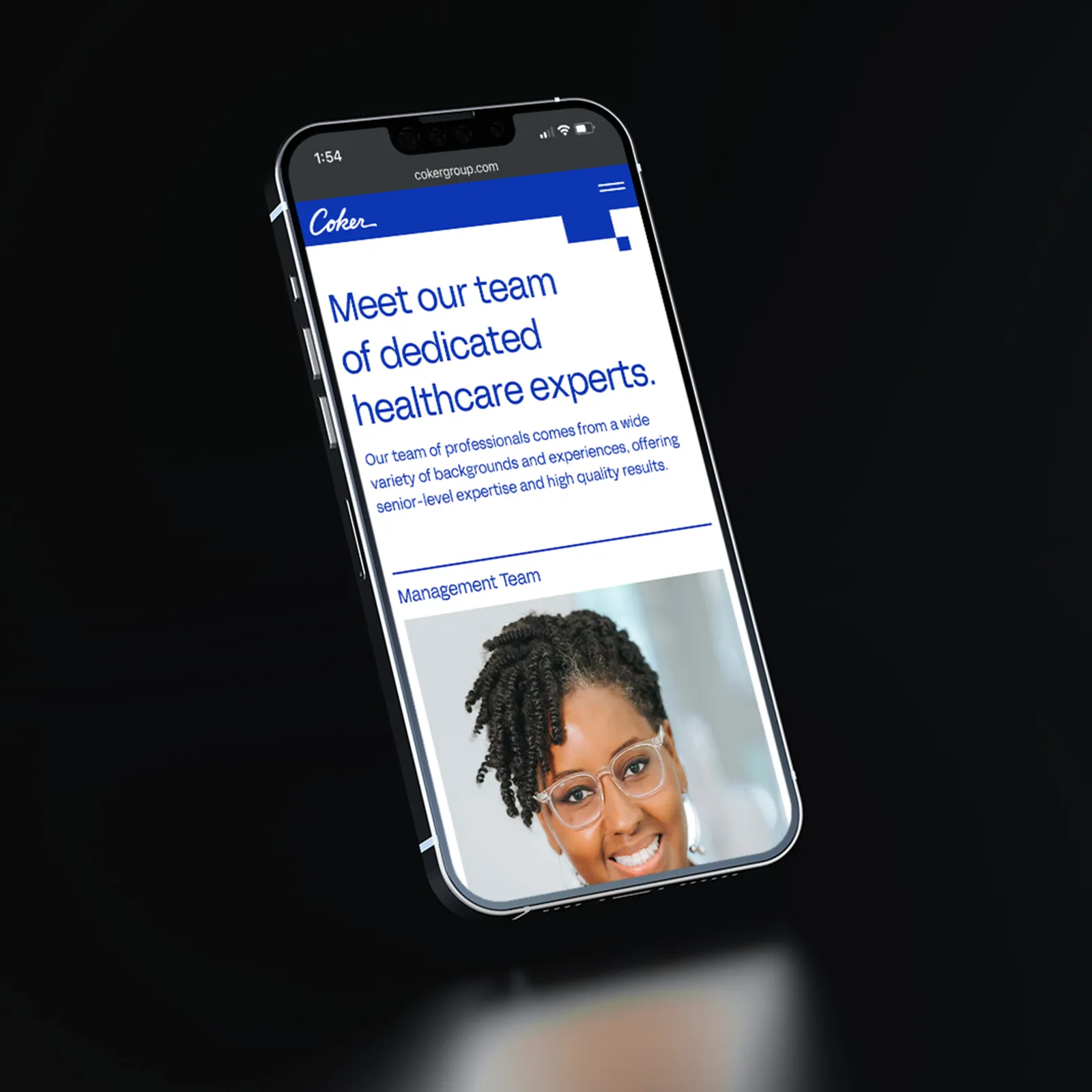Smartphone displaying a webpage titled 'Meet our team of dedicated healthcare experts' with a photo of a smiling woman wearing glasses under the Management Team section.