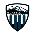 Shield-shaped logo with a Seattle skyline silhouette, mountain in the background, and four vertical bars below, with the text 'Seattle Adaptive Sports' in the center.