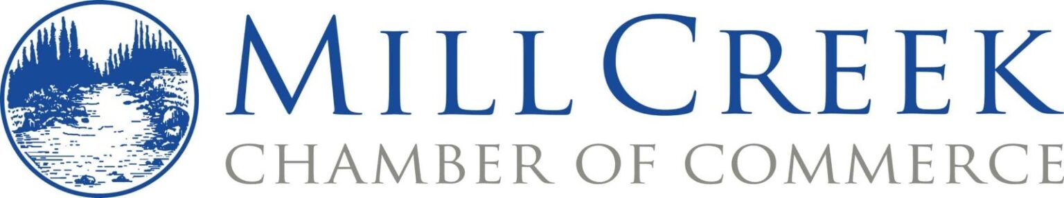 Logo for Mill Creek Chamber of Commerce featuring a circular emblem with a stylized creek and trees in blue to the left of the text.