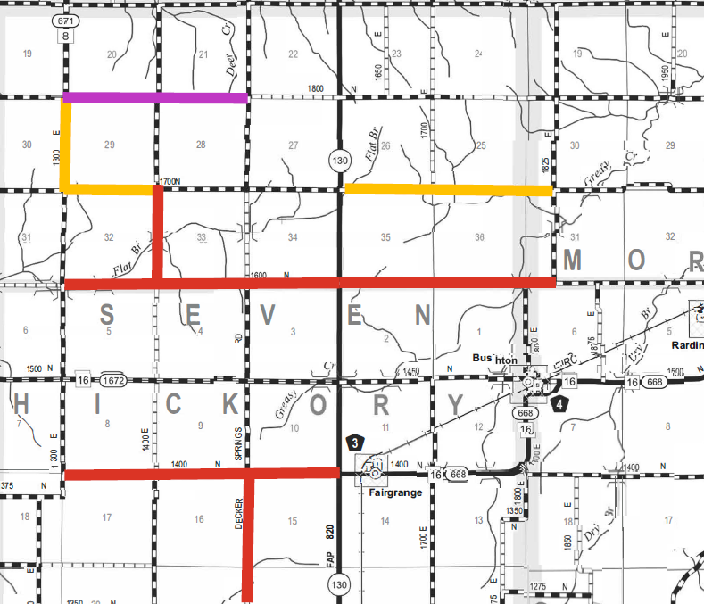 Black and white grid map of part of Seven Hickory and Mori counties with roads marked by red, orange, and purple colored lines; major roads labeled 16, 130, 668, with towns Bushton and Fairgrange labeled.