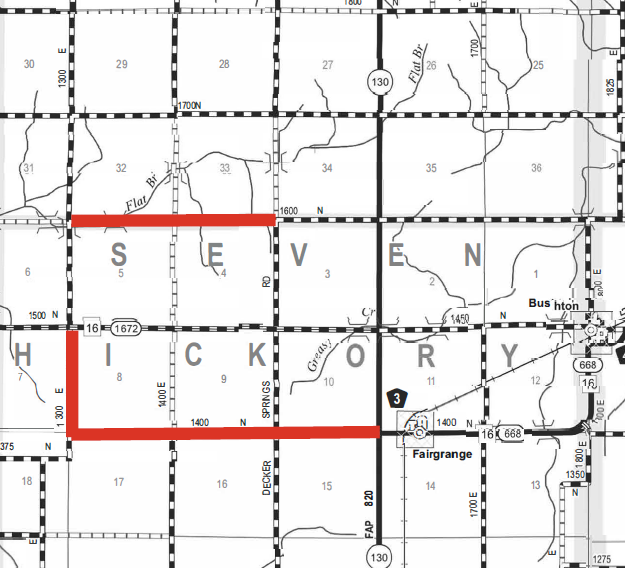 Black and white grid map section showing areas labeled with large letters spelling sequences including SEVEN, HICKORY. Roads marked with numbers such as 1672, 16, and 130 intersect the grid. The towns of Fairgrange and Bushton appear at the bottom right with highway numbers 3, 668, and 16. Red lines highlight parts of roads along the top of SE and the bottom of HICK. Various smaller road numbers and names like Flat Br, Greasy Cr, Springs, and Decker are visible within grid squares.