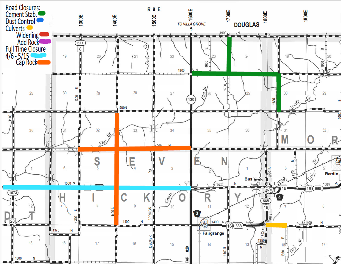 Map of road closures and maintenance in a rural area with roads marked by different colored lines indicating cement stabilization (green), dust control (blue), culverts (yellow), widening (red), add rock (purple), full-time closure from April 6 to May 15 (light blue), and cap rock (orange). The map includes roads labeled with numbers and directions such as 1300E, 1400E, 1500E, and the town of Bushton near the center right.
