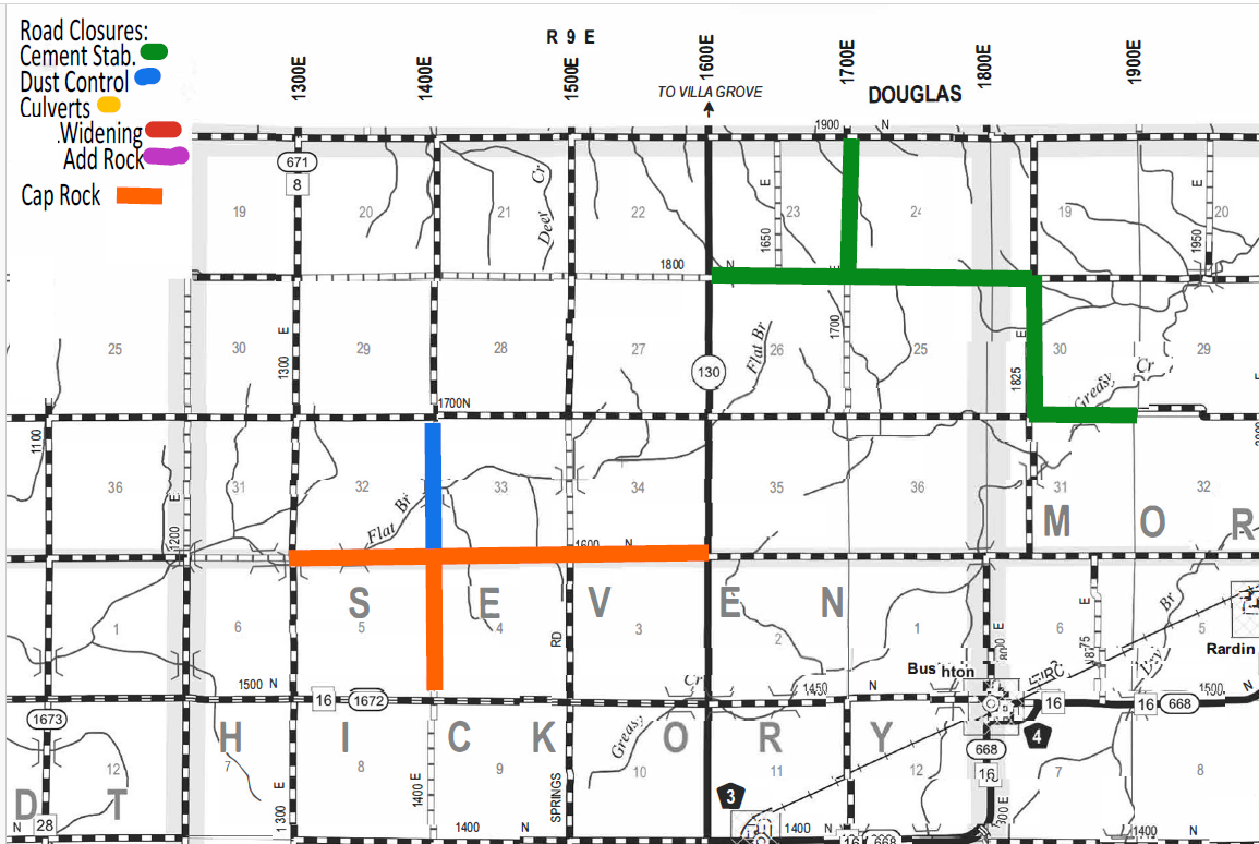 Map showing road closures in parts of Douglas and Hickory counties with color-coded lines: green for cement stabilization, blue for dust control, yellow for culverts, red for widening, pink for adding rock, and orange for cap rock, displayed on a grid with numbered sections and roads, including Highway 130 and 16.