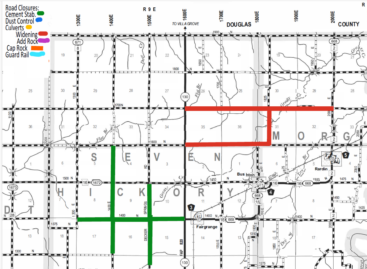 Map showing road closures and improvements in a grid layout with main roads labeled by coordinates and numbers; green lines indicate cement stabilization, red lines indicate widening, and magenta lines indicate adding rock, with other types color-coded but not shown on the visible part of the map; locations include Fairgrange, Bushton, and Rardin in Douglas County with surrounding area divisions by township and range coordinates.
