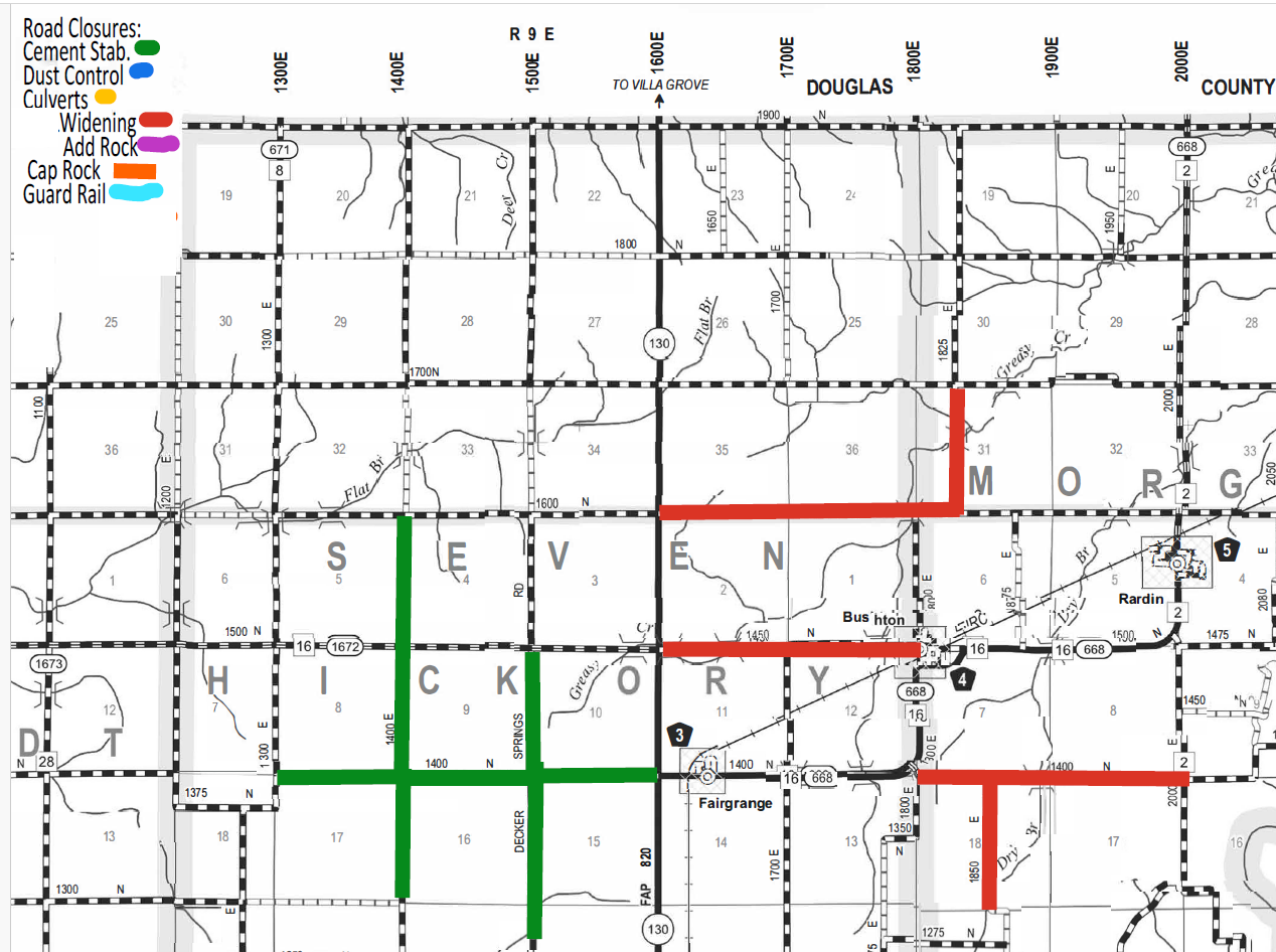 Map section showing road closures in Hickory and Morg counties with color-coded lines indicating types: green for cement stabilization, blue for dust control, yellow for culverts, red for widening, purple for adding rock, orange for cap rock, and light blue for guard rail. Roads and town names like Fairgrange, Bushton, and Rardin are labeled along with route numbers and grid coordinates.