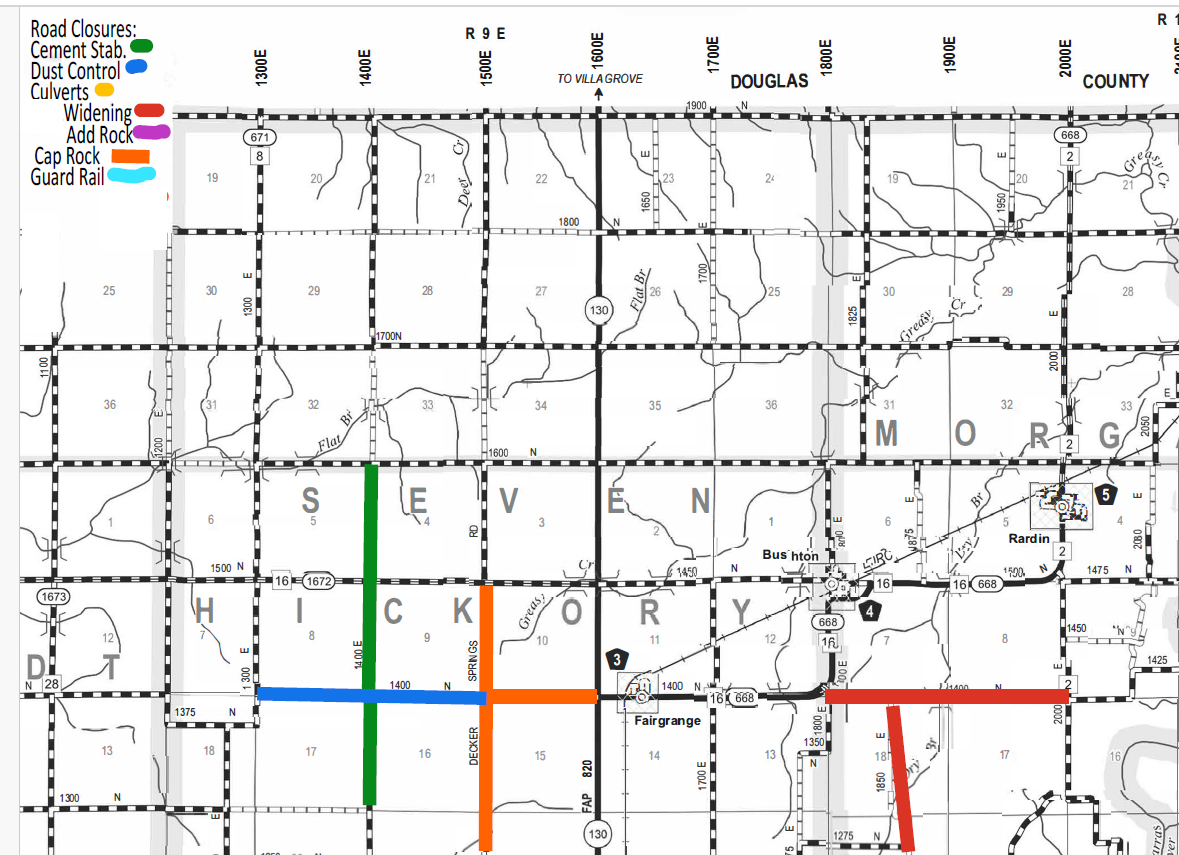 Map of Hickory and surrounding regions with color-coded road markings and a legend indicating road closures, cement stabilization (green), dust control (blue), culverts (orange), widening (red), add rock (purple), cap rock (bright orange), and guard rail (light blue). Various roads are labeled by numbers and directional grid coordinates, with towns like Fairgrange, Bushton, and Rardin marked on the map. Bold lines denote major roads and thin lines minor roads.