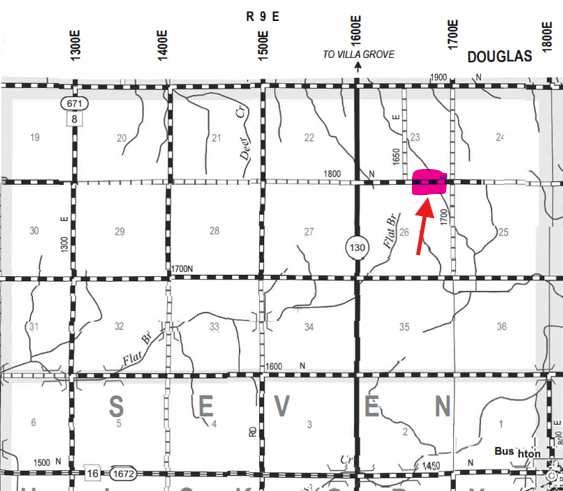 Section of a black and white grid-style road map showing roads and township boundaries around Douglas; a location near road 130 and road 1700N is highlighted in pink with a red arrow pointing to it.