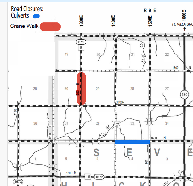 Partial road map with grid layout, showing road closures indicated by blue lines for culverts and red blocks for Crane Walk closures, featuring numbered roads and sections, including highways 671, 130, 16, and local roads 1300E, 1400E, 1500E, 1600E, with closures marked near 1300E and a horizontal closure south of Flat Branch.