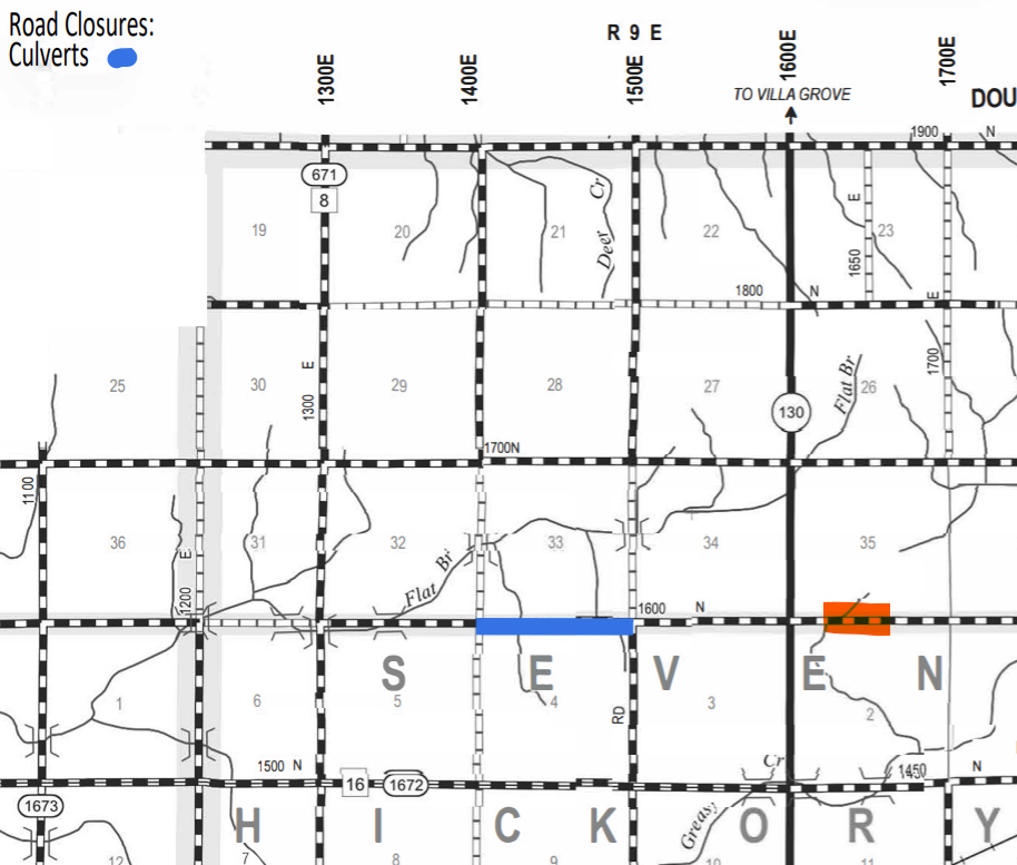 Map showing road closures in a grid layout with roads identified by numbers and letters, including culvert closures marked in blue and orange sections on roads near the center and right side of the map.