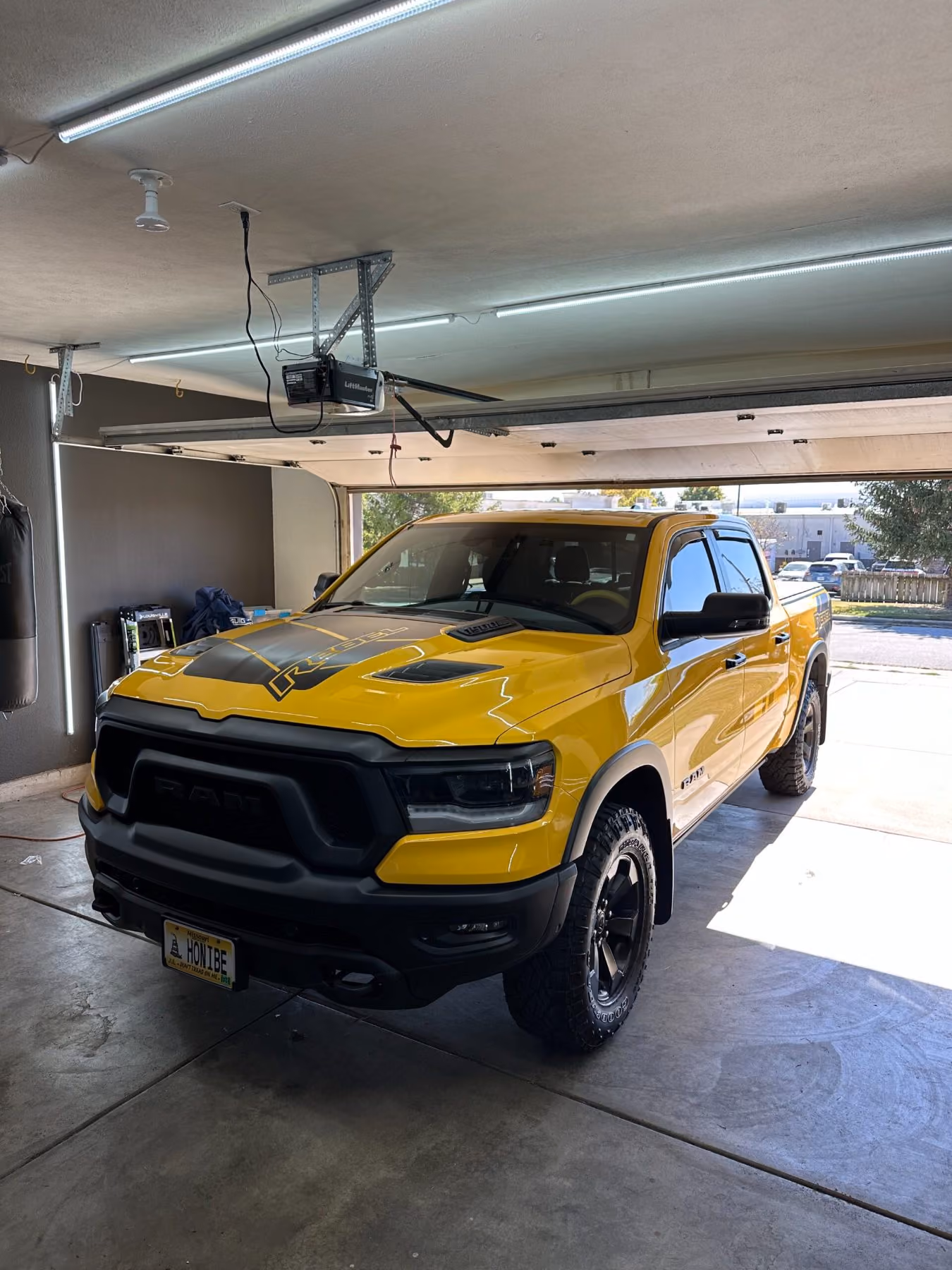 Yellow Ram truck after an exterior detail at Detail Armor