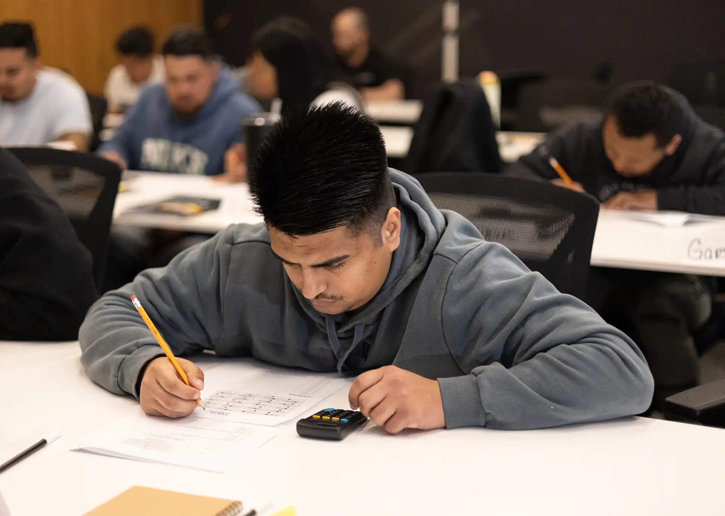 Student working through exam practice
