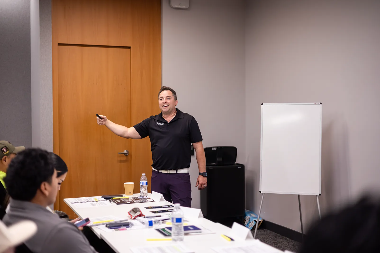 IRI program director teaching a roofing class
