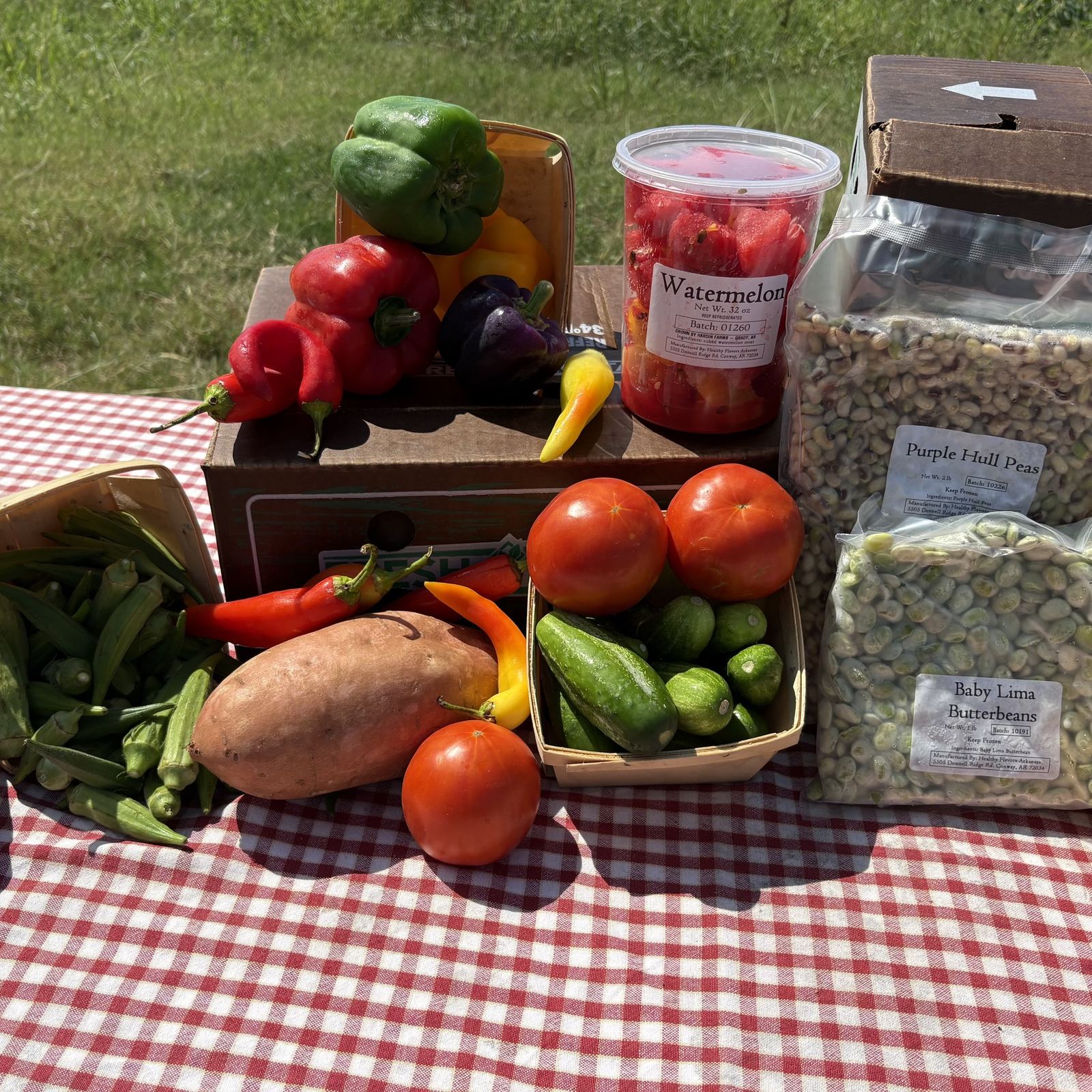 FRESH Box with peppers, tomatoes, okra, cucumbers, a sweet potato, watermelon and frozen purple hull peas