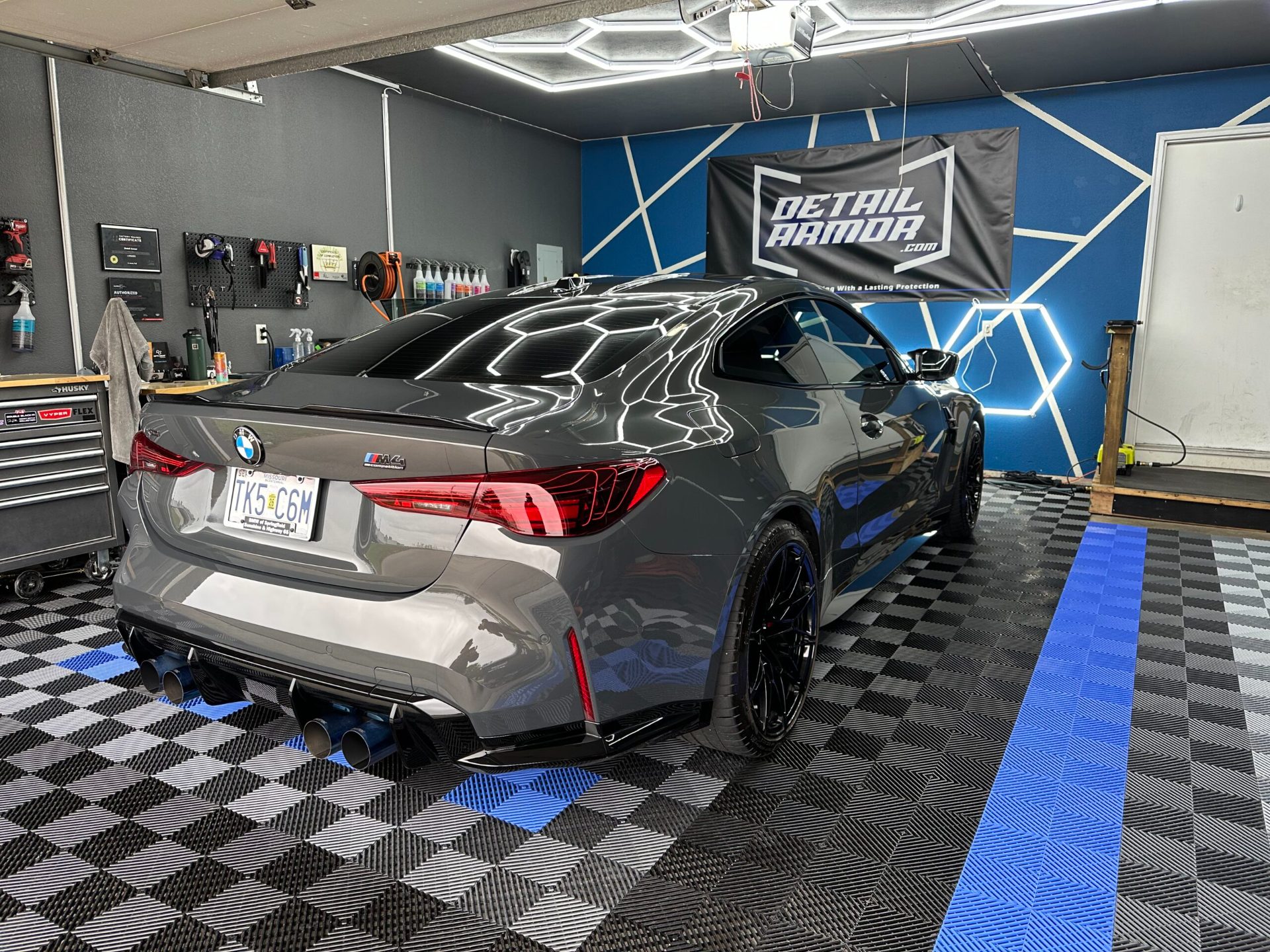 Gray BMW M4 after paint correction and a ceramic coating