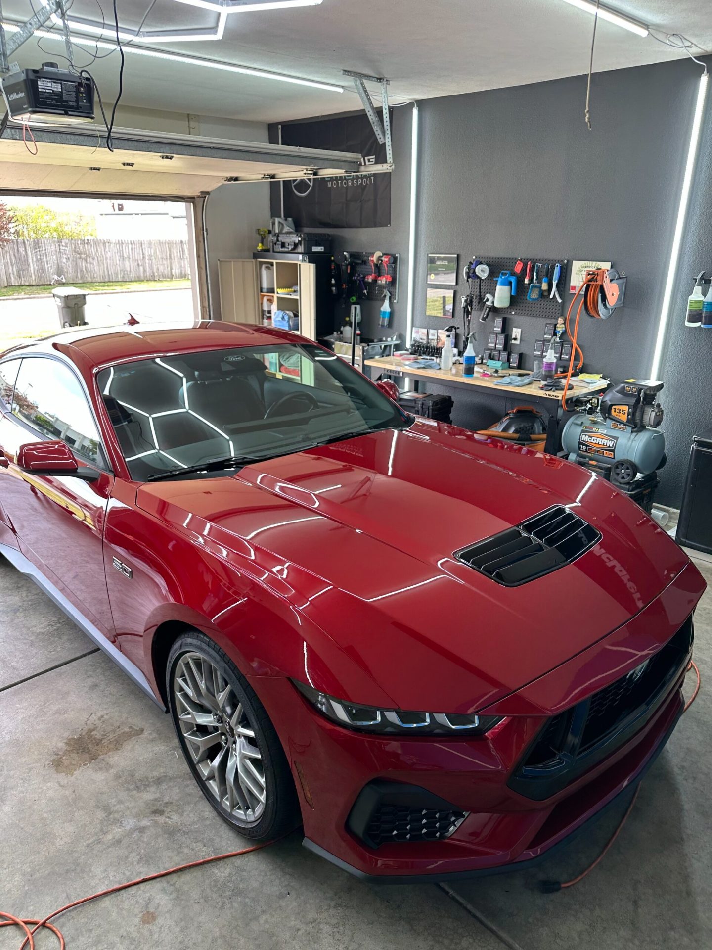 Red Ford Mustang GT with full front PPF, paint correction and a ceramic coating