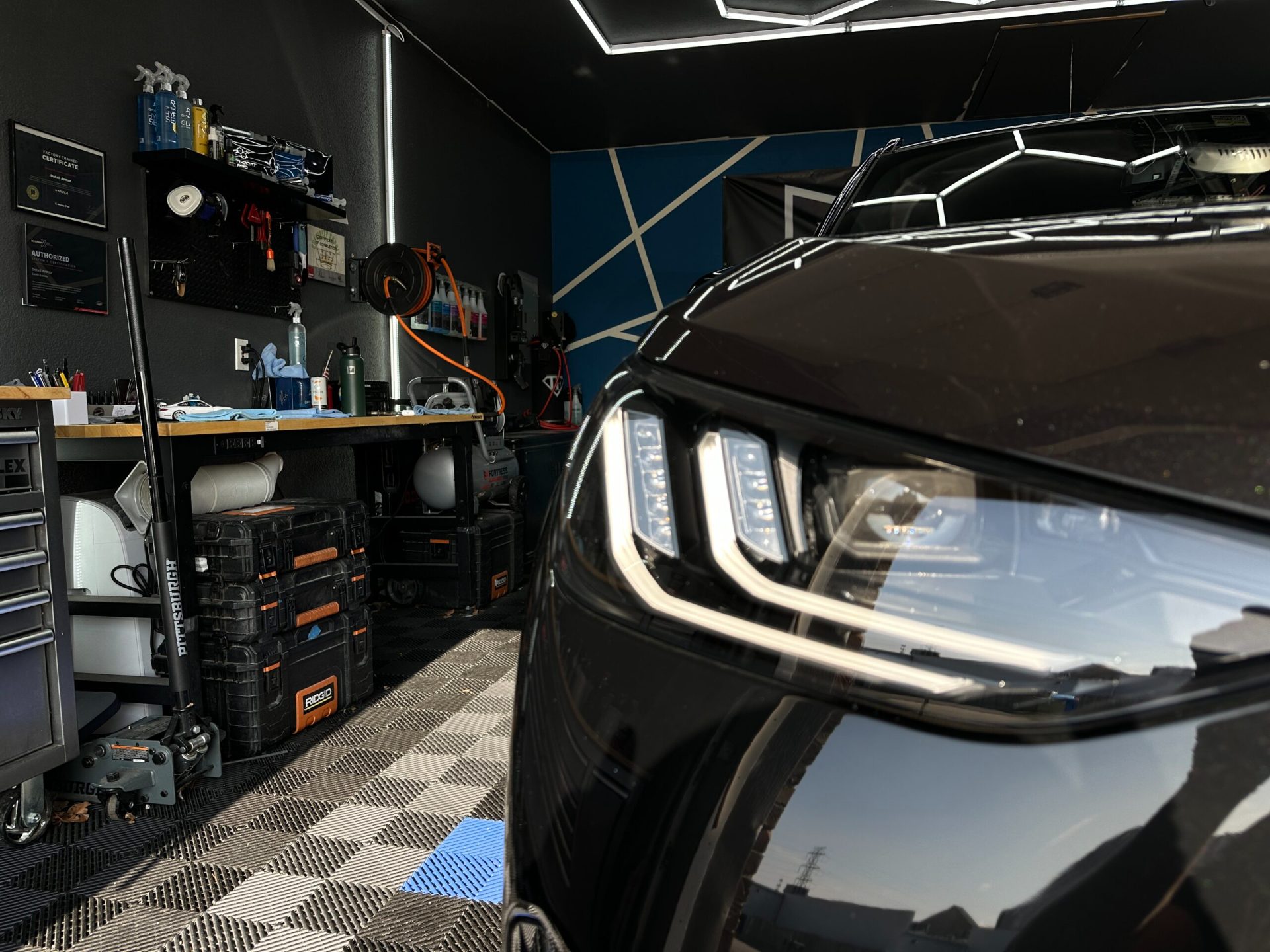 Close up of a ceramic coated BMW X3 headlight