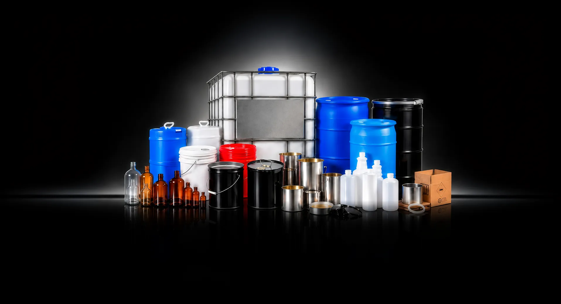 Plastic, glass and metal containers, drums, pails and an IBC tote shown together